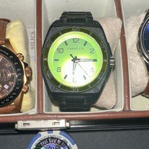 Caravelle Men's Black and Green Dial Watch